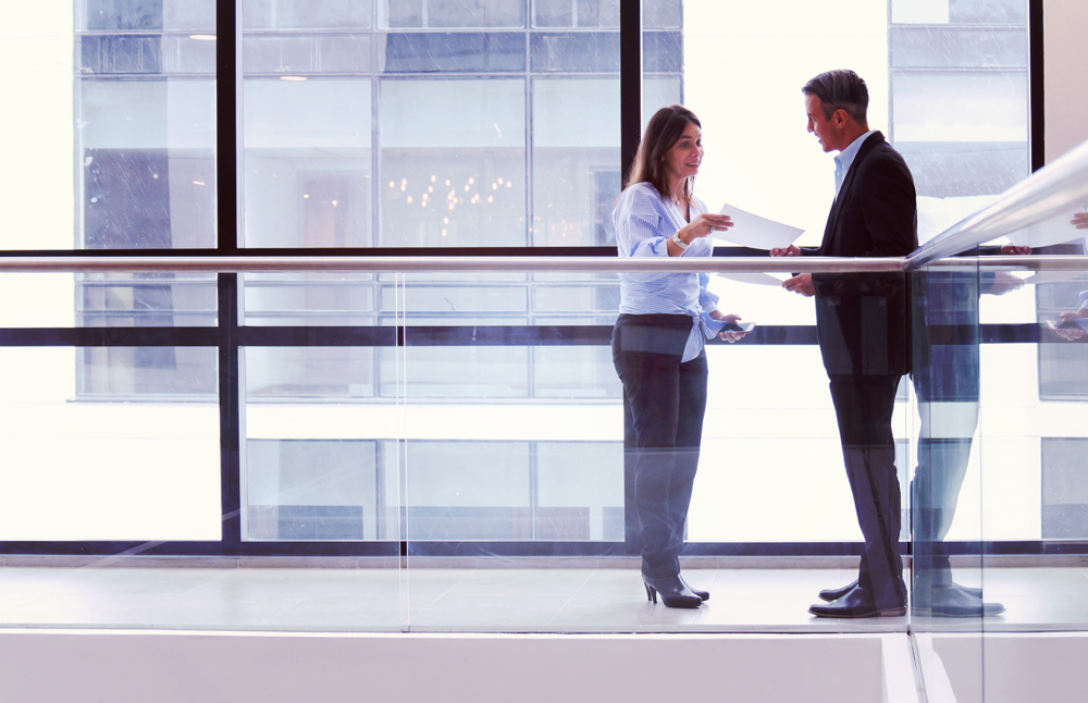 Istock 1182958427 Business People Talking Blue